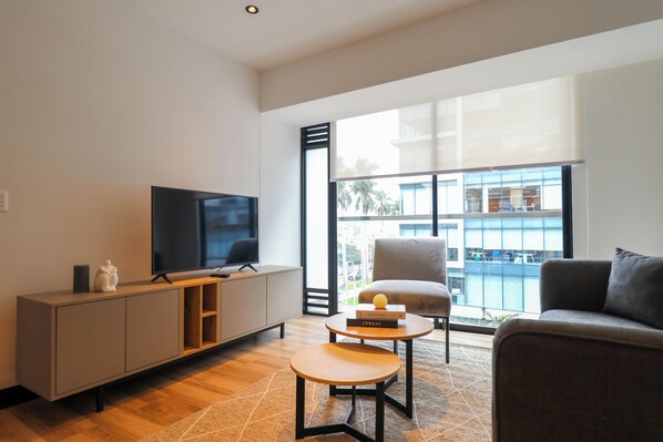 Apartament (406) | Sala d'estar | Televisor intel·ligent de 40 polzades amb canals per cable