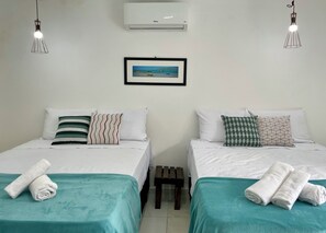 Comfort Quadruple Room, Pool View | Free WiFi - Do Adriano Suites (Búzios)