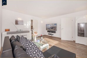Unclassified image, 4 of 30, button - Insel Paradies - Modern vacation apartment by the lake with terrace and garden view on (Kamminke)