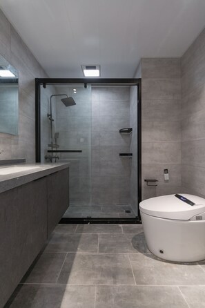Shower, hair dryer, towels, soap