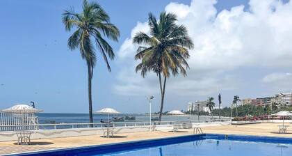 Apartamento con vista al mar, playa, piscina, A/C, Wi-FI, tanque de agua,
