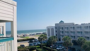 Property grounds - Cozy condo near the beach with balcony, pool, W/D, AC, & views (Galveston)