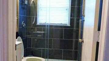 Shower, eco-friendly toiletries, hair dryer, bidet