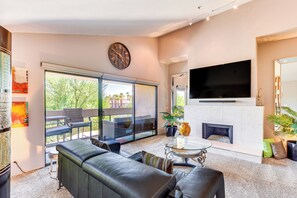 TV, fireplace - Community Pool Access: Chic Palm Springs Condo (Palm Springs)