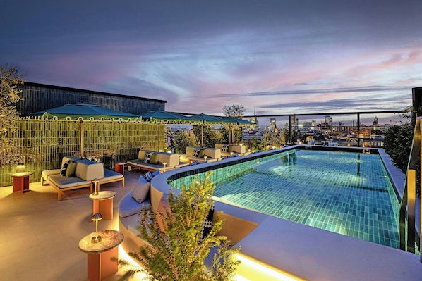 Outdoor pool, open 8:00 AM to 5:00 PM, pool umbrellas, sun loungers
