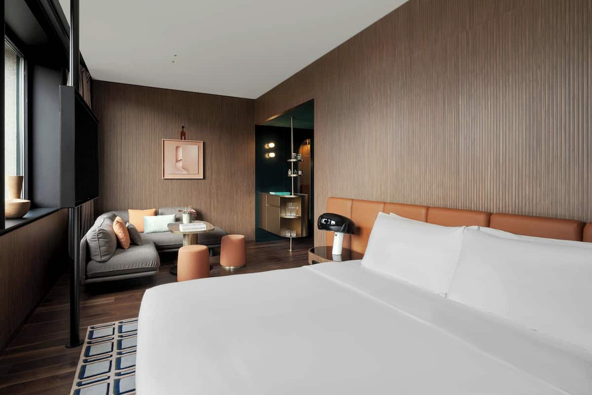 Suite, 1 King Bed, Balcony, City View | 1 bedroom, hypo-allergenic bedding, minibar, in-room safe
