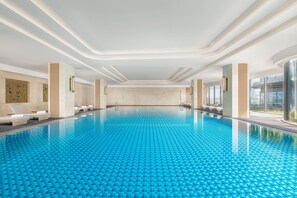 Indoor pool, open 6:00 AM to 10:30 PM, sun loungers - Lishui Marriott Hotel (Lishui)