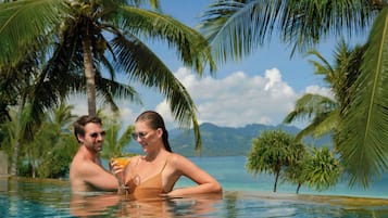 2 outdoor pools, pool umbrellas, pool loungers