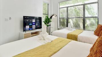 4 bedrooms, desk, iron/ironing board, travel cot