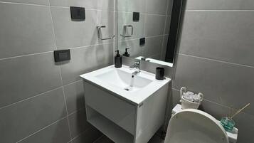 Hair dryer, towels, soap, toilet paper