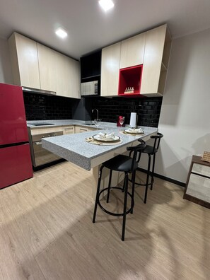 Fridge, microwave, oven, electric kettle