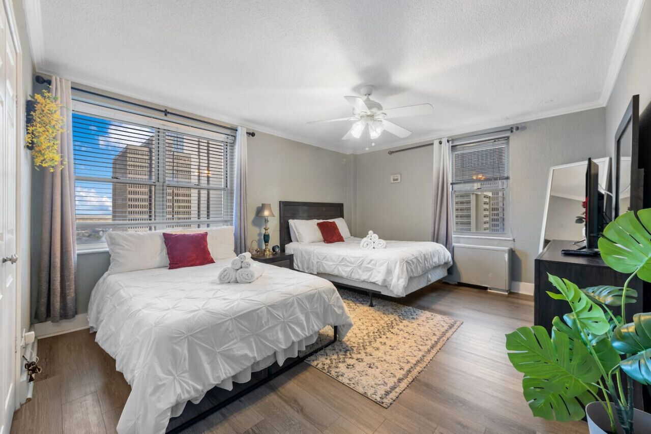 1 bedroom, desk, iron/ironing board, travel crib