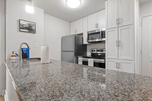 Fridge, microwave, oven, stovetop - Skyline Vistas | Downtown | Perfect Romantic Getaways (Atlanta)