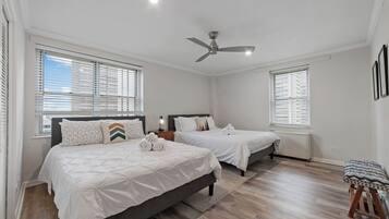 1 bedroom, desk, iron/ironing board, travel crib