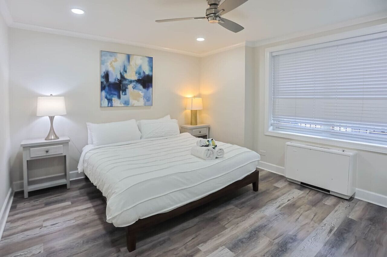 1 bedroom, desk, iron/ironing board, travel crib