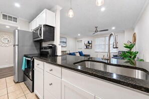 Coffee/tea maker, fridge, microwave, oven