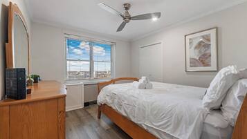 1 bedroom, desk, iron/ironing board, travel crib