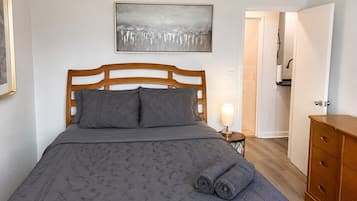 1 bedroom, desk, iron/ironing board, travel crib