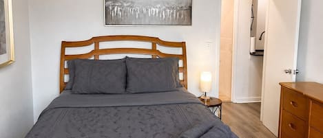 1 bedroom, desk, iron/ironing board, travel crib