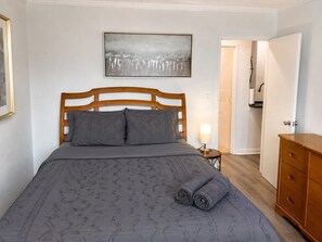 1 bedroom, desk, iron/ironing board, travel cot