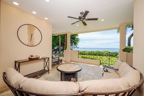 Terrace/patio - Sol y Mar 2C Fully equipped Beachfront 3BR condo w/ pool & easy access to the beach (Playa Hermosa)