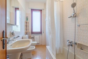 Hair dryer, bidet, towels