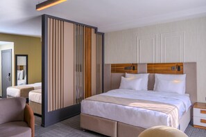 Suite studio | Literie de qualité, coffre-fort, rideaux d’obscurcissement