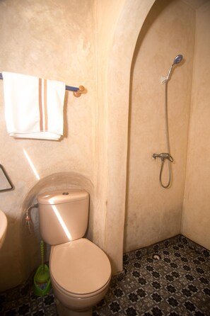 Shower, towels, soap, toilet paper