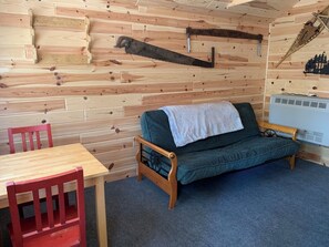 Living area - Henry's Cabin - Johnswood Off Grid Cabins on Drummond Island (Drummond Island)