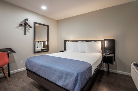 Standard Single Room, 1 Queen Bed, Non Smoking | Free WiFi, bed sheets