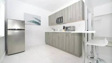 Fridge, microwave, coffee/tea maker, toaster