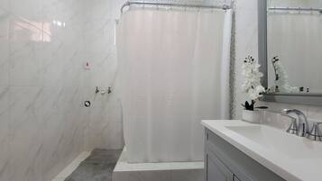 Shower, towels, soap, shampoo