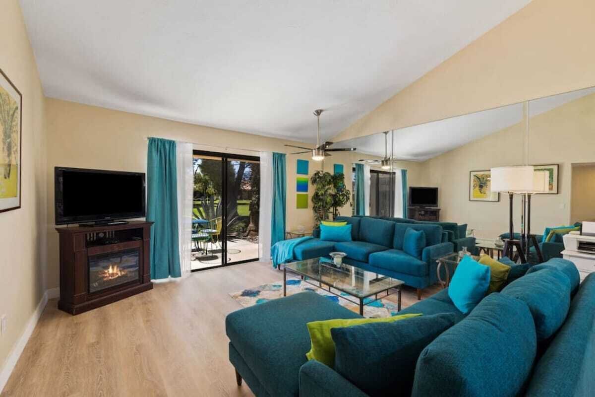 TV, fireplace, books, offices