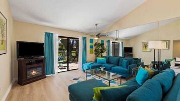 TV, fireplace, books, offices