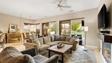 TV, fireplace, books, offices