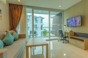 Basic Condo, Pool View | Living area
