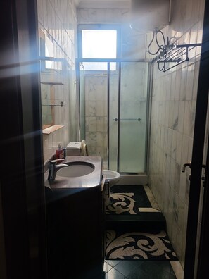 Shower, towels, soap, shampoo