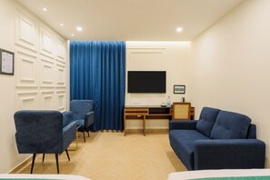 Desk, blackout curtains, iron/ironing board, bed sheets - Treebo Premium Aasma Courtyard (Kujang)