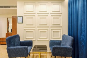 Desk, blackout curtains, iron/ironing board, bed sheets - Treebo Premium Aasma Courtyard (Kujang)