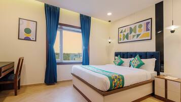 Economy Double Room | Desk, blackout curtains, iron/ironing board, bed sheets