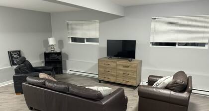 Stylish and cozy suite minutes away from Town!