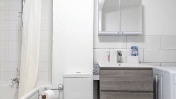Hair dryer, towels, soap, shampoo