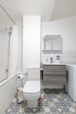 Hair dryer, towels, soap, shampoo