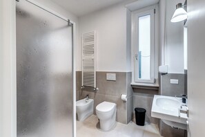 Hair dryer, towels, soap, toilet paper