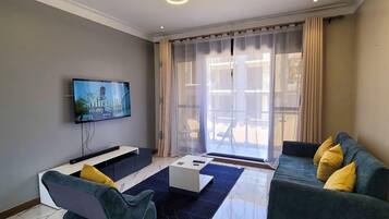 Luxury Apartment, City View | Living area
