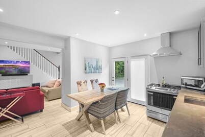 2BR Downtown Retreat: Mins to Beach, BBQ & Firepit