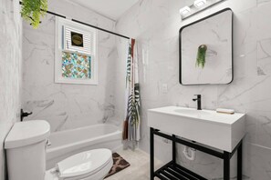 Hair dryer, towels, soap, shampoo