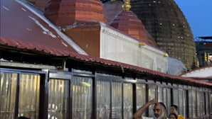 A row of traditional buildings with domed roofs and golden spires, likely part of a historical or cultural site. - Matree Grand Lodge By GRB (Guwahati)
