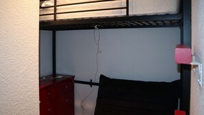 A bunk bed with a mattress and a red dresser. - Ski-in/ski-out studio, Les Orres 1650 center, 4 people (Les Orres)