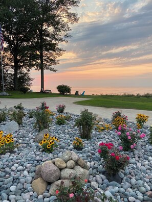 A park with a pathway, benches, and a view of the water. - House on Lake Erie Bluff! Gorgeous lakefront view with spectacular sunsets! (Lake City)